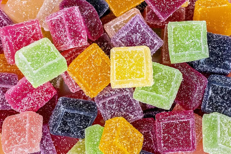 Image depicting various colorful gummy candies, illustrating a conceptual "THC Gummies UK" product.